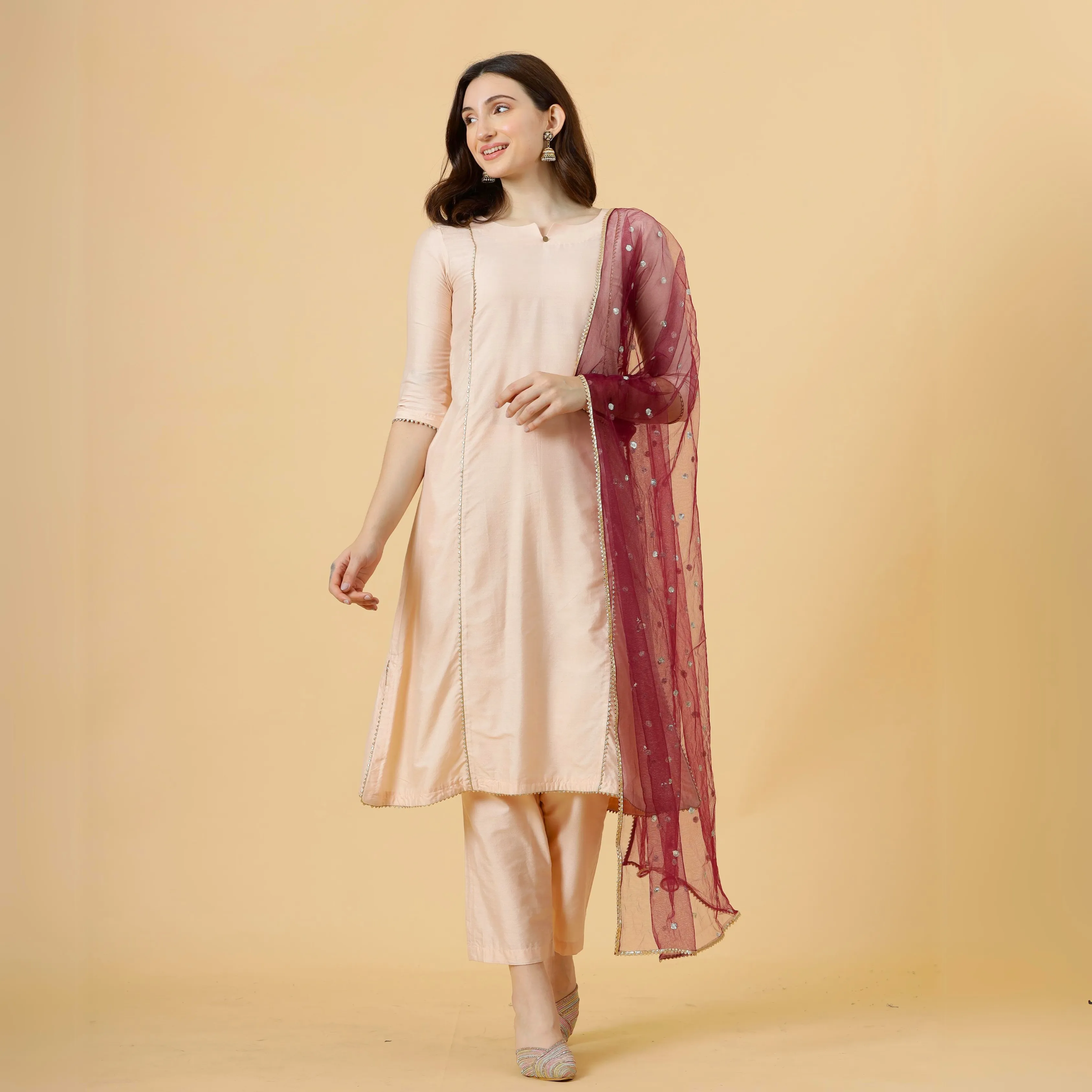 Stylish Peach A-Line Kurti-Palazzo Set paired with Wine Sequin dupatta